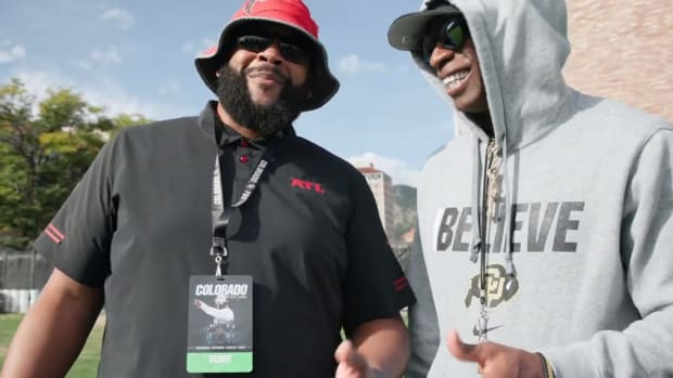 Atlanta Falcons scout Rich Sanders at Colorado with Coach Prime